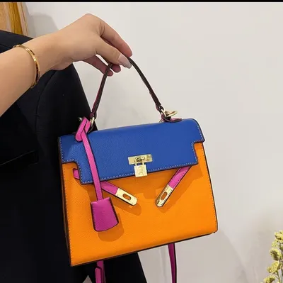 Orange blue and pink hand bag