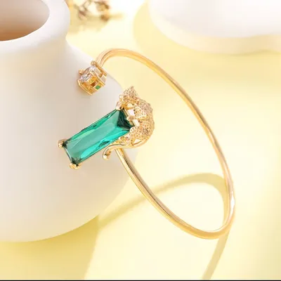 Gold tiger bangle