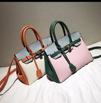 Pink and green formal handbag